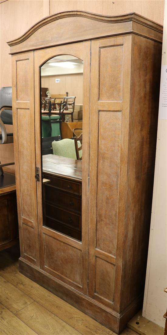 A limed oak wardrobe, H.201cm